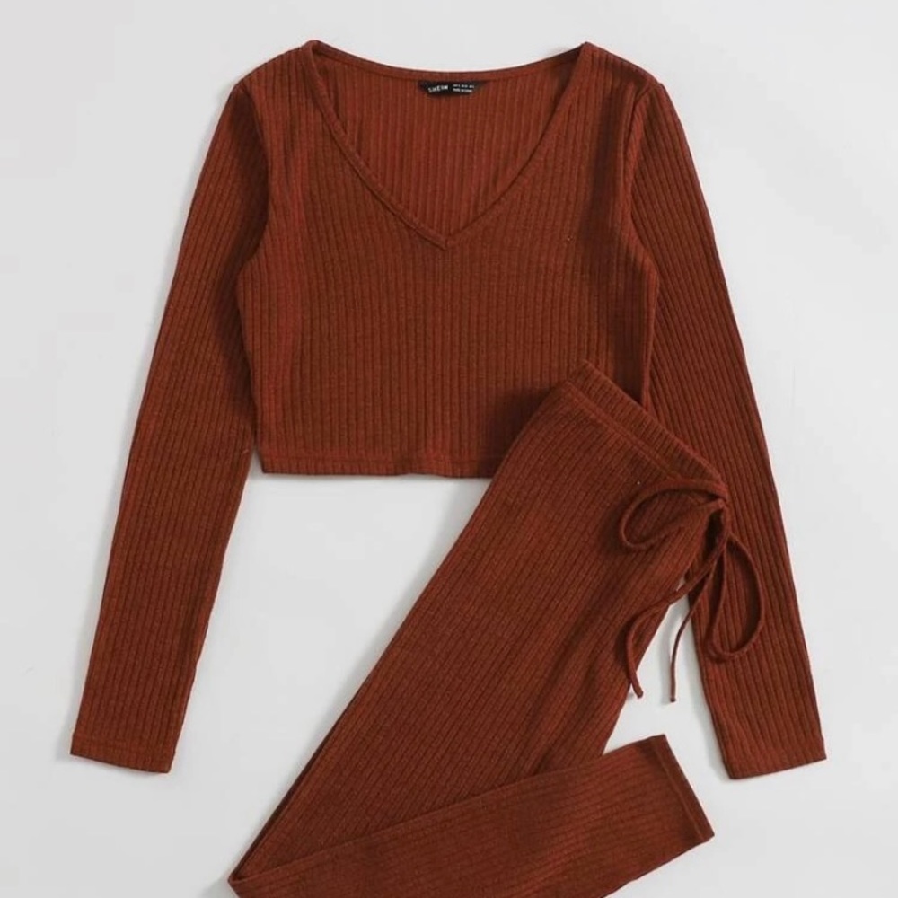 2 pc outfit. Burnt Orange color. Crop top and high waisted leggings.
